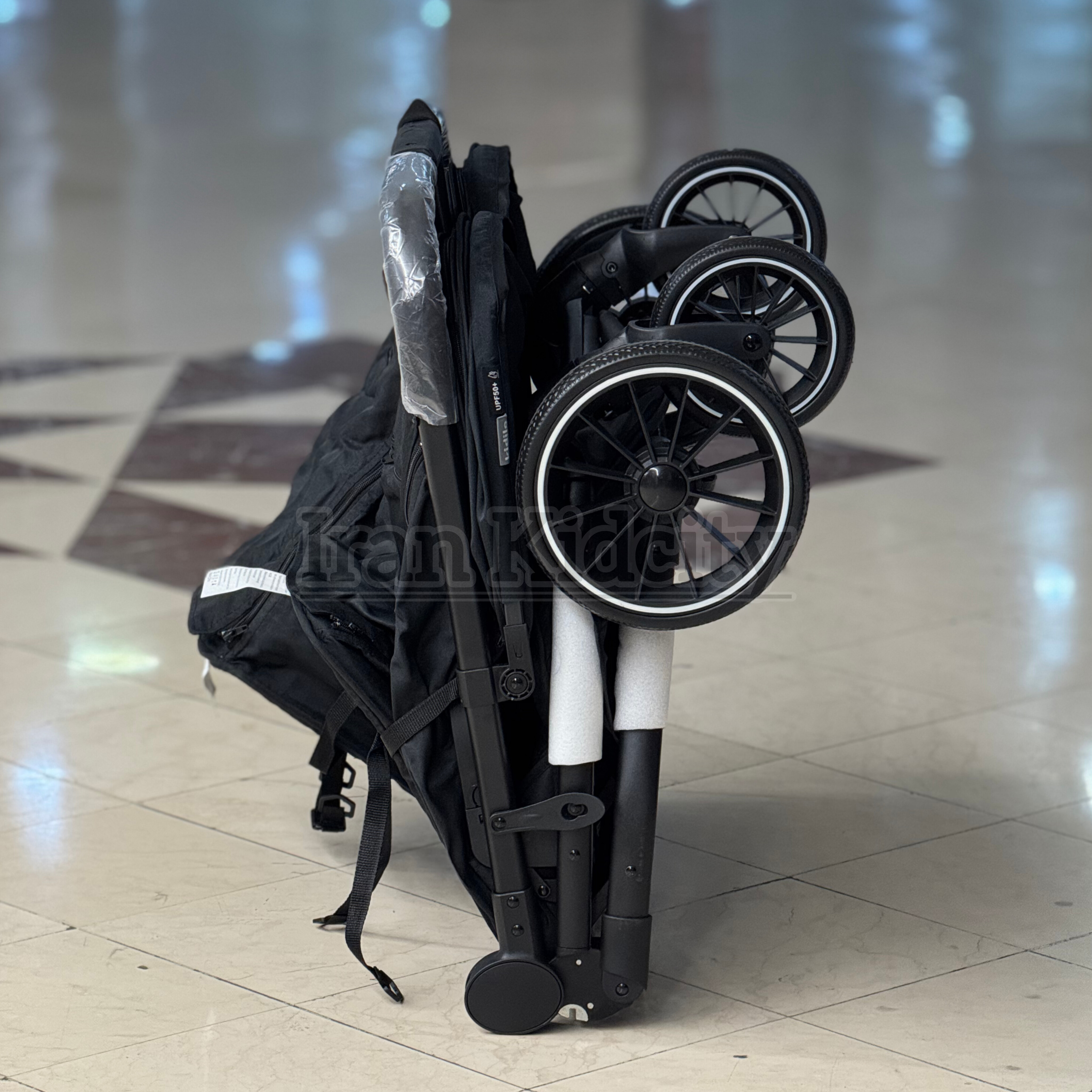 کالسکه دوقلو مسافرتی کیدیلو